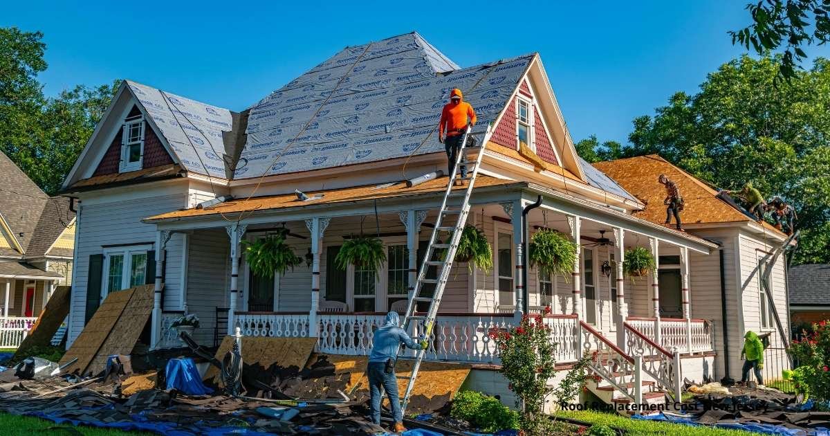 Roofing crew replacing architectural asphalt shingles on a suburban New Jersey home