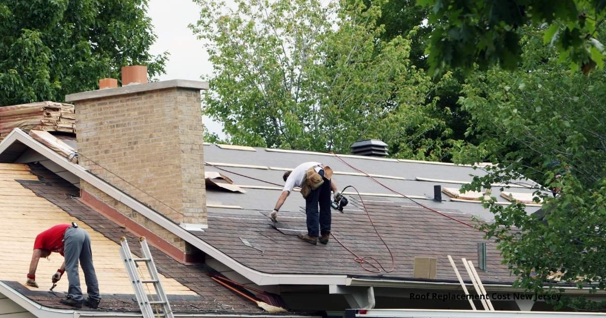 Roofing crew replacing architectural asphalt shingles on a suburban New Jersey home